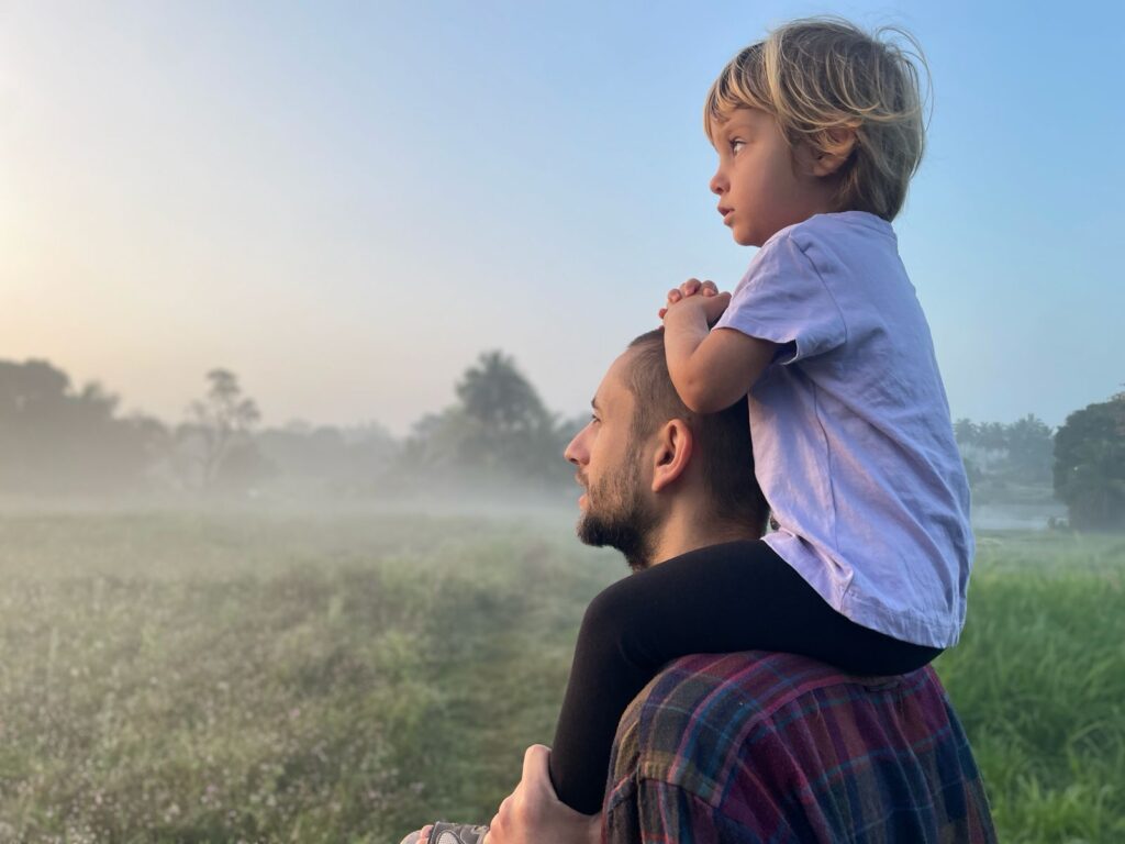 Dad and daughter watching landscape