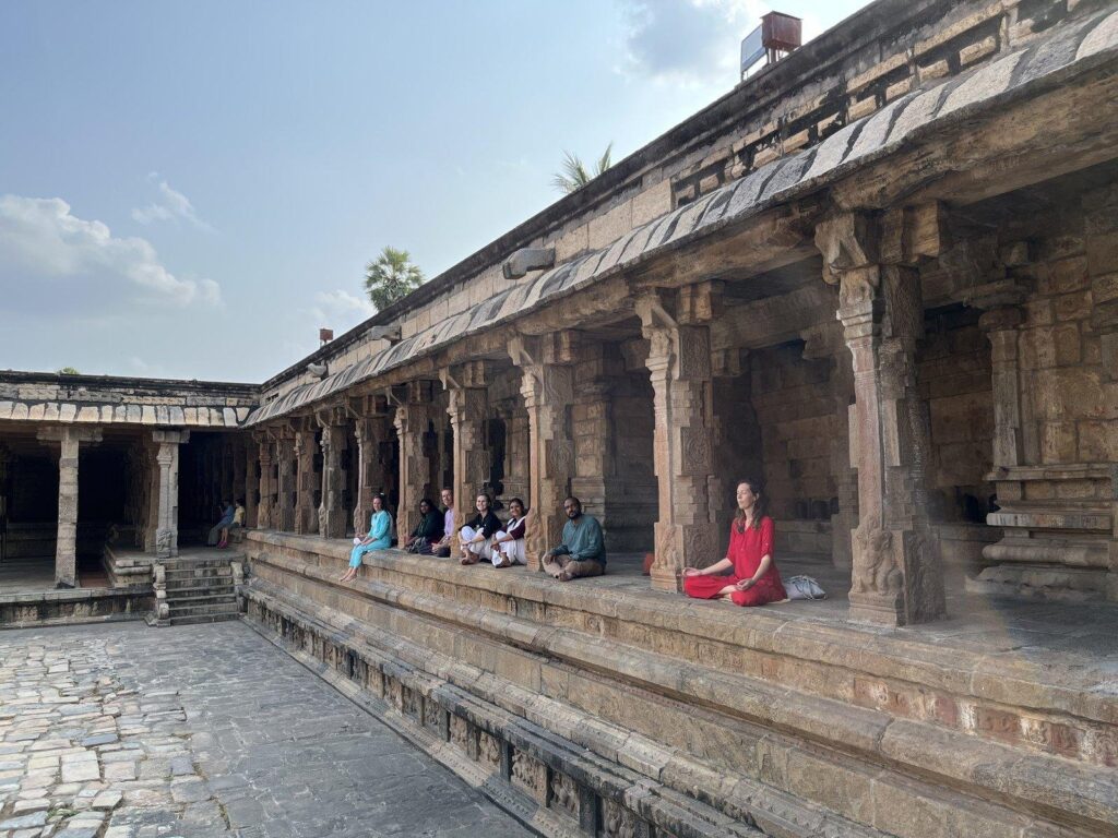 Meditation in the temple colonnade near Yoga Gita Ashram by the Kaveri